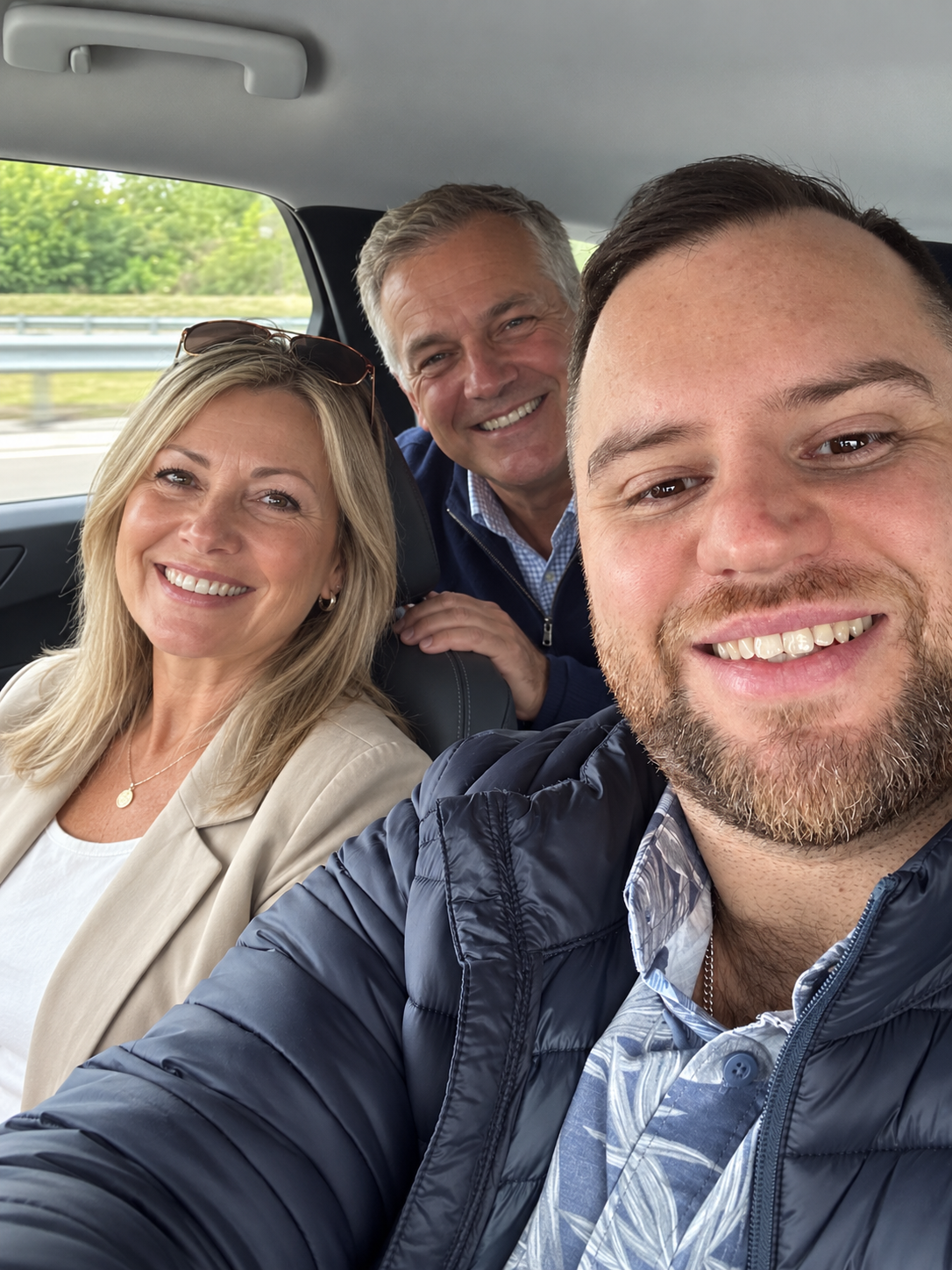 Ross in the car with a couple of cruise guests